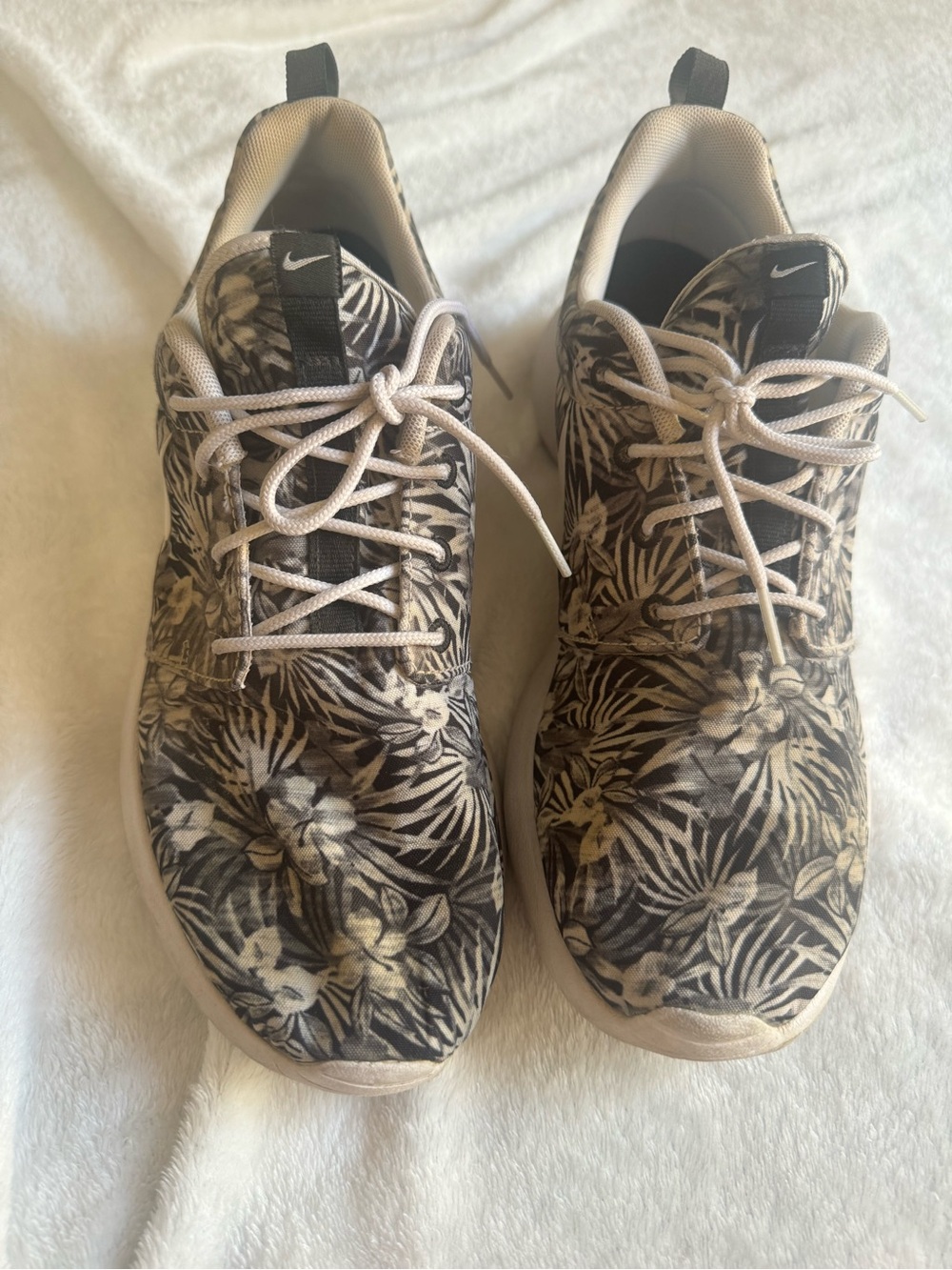 Nike Roshe Run sneakers with black and white floral print